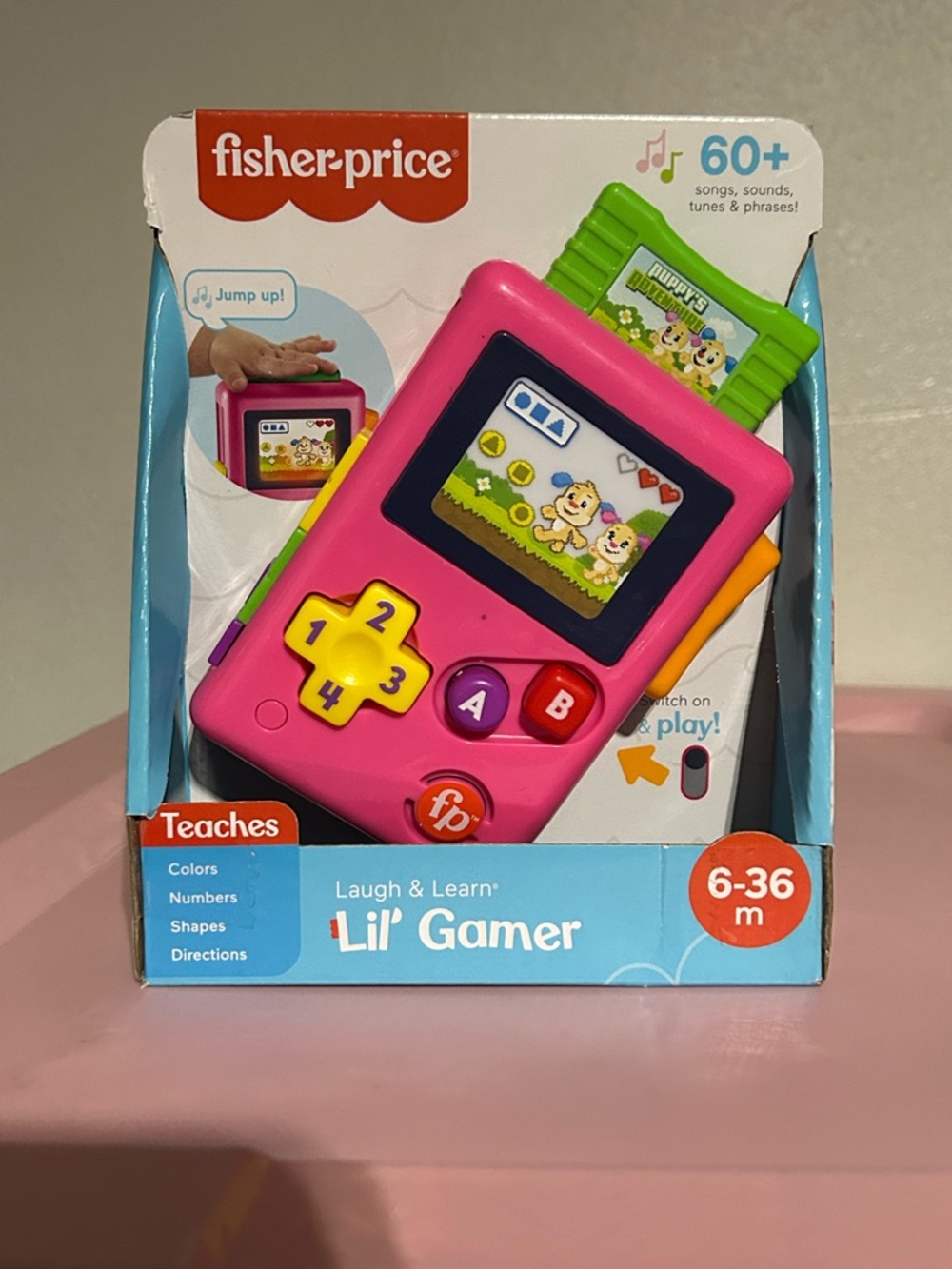 Fisher-Price Pink Interactive Toddler Game Console with Yellow & Green Buttons